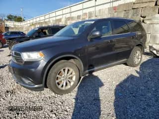 2014 Dodge Durango SXT with VIN 1C4RDJAG3EC468467, listed as a Copart auction lot 84253665 with 121,326 mi miles and Salvage title. Bid and sale history available at DreamBid. Image 1.