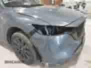 2024 Mazda CX-5 S Preferred z VIN JM3KFBCM0R0398834, wystawiony jako IAAI lot #42841174 z przebiegiem 6 031 mil mil oraz . Historia ofert i sprzedaży dostępna na DreamBid. Obrazek 21.
