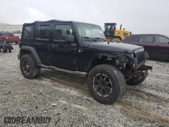 2008 Jeep Wrangler Unlimited X с VIN 1J4GA39108L508157, выставлен на аукционе Copart как лот 82234055 с пробегом Не указан миль и Списание • Salvage title. История ставок и продаж доступна на DreamBid. Изображение 4.