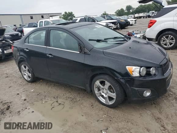 2016 Chevrolet Sonic LTZ с VIN 1G1JE5SB9G4183153, выставлен на аукционе Copart как лот 58444265 с пробегом Не указан миль и Списание • Salvage title. История ставок и продаж доступна на DreamBid. Изображение 4.
