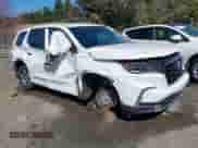 2024 Honda Pilot EX-L with VIN 5FNYG2H57RB001333, listed as a IAAI auction lot 41707956 with 35,865 mi miles and . Bid and sale history available at DreamBid. Image 1.