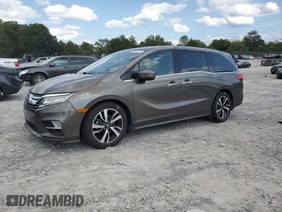 2018 Honda Odyssey Elite with VIN 5FNRL6H98JB048367, listed as a Copart auction lot 80057575 with 107,887 mi miles and Clean title. Bid and sale history available at DreamBid. Image 1.