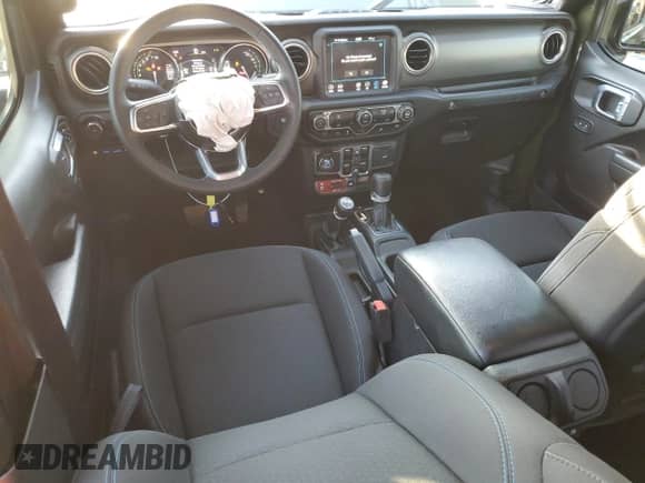 2023 Jeep Wrangler Rubicon with VIN 1C4JJXR63PW562354, listed as a Copart auction lot 76093264 with 25,498 mi miles and Salvage title. Bid and sale history available at DreamBid. Image 8.