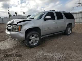 2011 Chevrolet Suburban LT with VIN 1GNSCJE02BR339623, listed as a Copart auction lot 59632745 with 220,125 mi miles and Salvage title. Bid and sale history available at DreamBid. Image 1.
