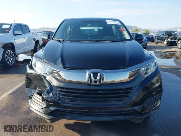 2022 Honda HR-V LX z VIN 3CZRU6H31NM722816, wystawiony jako IAAI lot #43155997 z przebiegiem 65 443 mil mil oraz . Historia ofert i sprzedaży dostępna na DreamBid. Obrazek 12.