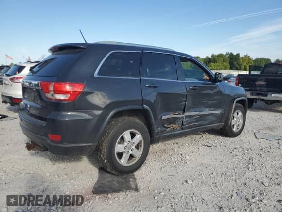 2011 Jeep Grand Cherokee Laredo с VIN 1J4RR4GG4BC590030, выставлен на аукционе Copart как лот 70199405 с пробегом 204 419 миль миль и Списание • Salvage title. История ставок и продаж доступна на DreamBid. Изображение 3.