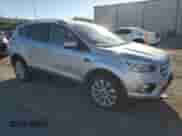 2017 Ford Escape Titanium с VIN 1FMCU0J97HUC56490, выставлен на аукционе Copart как лот 82139255 с пробегом 102 859 миль миль и Списание • Salvage title. История ставок и продаж доступна на DreamBid. Изображение 4.