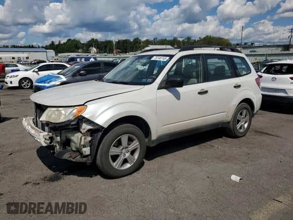 2013 Subaru Forester X z VIN JF2SHABC0DG424937, wystawiony jako Copart lot #70748745 z przebiegiem 149 471 mil mil oraz Szkoda całkowita • Salvage title. Historia ofert i sprzedaży dostępna na DreamBid. Obrazek 1.