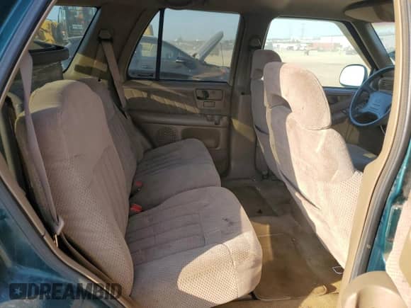 1996 Chevrolet Blazer with VIN 1GNDT13W3T2262402, listed as a Copart auction lot 62677515 with 168,312 mi miles and Salvage title. Bid and sale history available at DreamBid. Image 10.