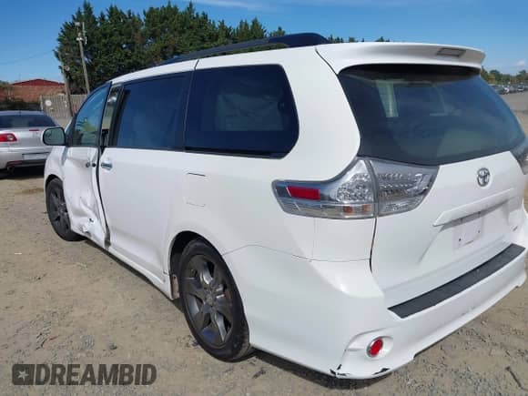2016 Toyota Sienna SE with VIN 5TDXK3DCXGS700517, listed as a IAAI auction lot 40573738 with 141,785 mi miles and . Bid and sale history available at DreamBid. Image 3.