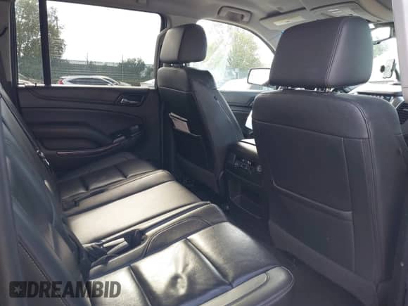 2018 Chevrolet Suburban LT z VIN 1GNSKHKCXJR235471, wystawiony jako IAAI lot #43363542 z przebiegiem 201 557 mil mil oraz . Historia ofert i sprzedaży dostępna na DreamBid. Obrazek 8.