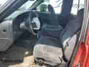 2000 Chevrolet Silverado 1500 with VIN 1GCEK14W2YE218542, listed as a Copart auction lot 64623235 with 242,232 mi miles and Salvage title. Bid and sale history available at DreamBid. Image 7.
