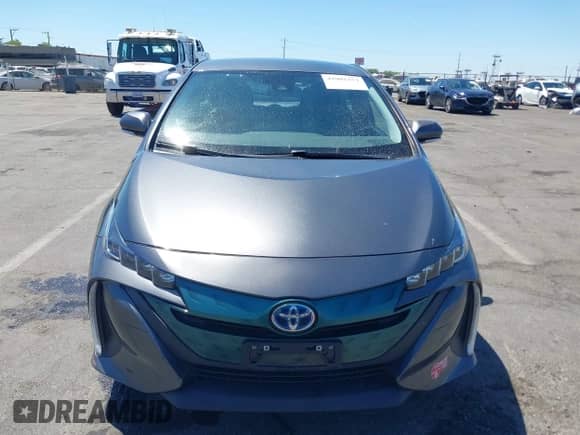 2018 Toyota Prius Plus z VIN JTDKARFP3J3073801, wystawiony jako IAAI lot #42903373 z przebiegiem 90 429 mil mil oraz . Historia ofert i sprzedaży dostępna na DreamBid. Obrazek 13.