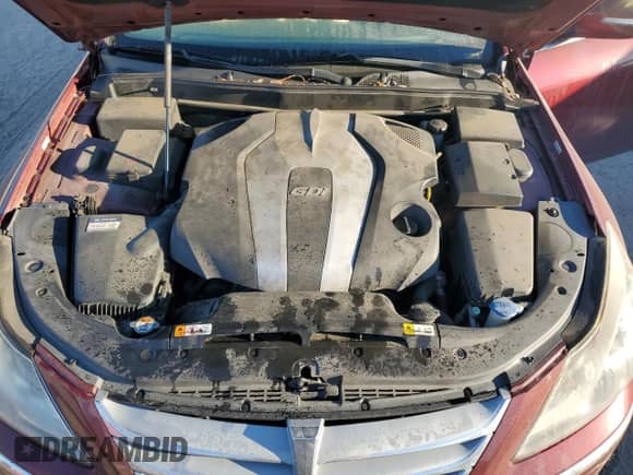 2013 Hyundai Genesis 3.8L z VIN KMHGC4DD8DU235248, wystawiony jako Copart lot #73462114 z przebiegiem 180 725 mil mil oraz Szkoda całkowita • Salvage title. Historia ofert i sprzedaży dostępna na DreamBid. Obrazek 11.