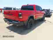 2019 Ram 1500 Rebel z VIN 1C6SRFLT4KN629703, wystawiony jako IAAI lot #42512908 z przebiegiem 135 868 mil mil oraz . Historia ofert i sprzedaży dostępna na DreamBid. Obrazek 4.