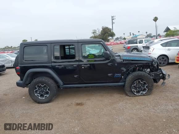 2023 Jeep Wrangler Rubicon with VIN 1C4JJXR68PW663339, listed as a IAAI auction lot 42433347 with 40,360 mi miles and . Bid and sale history available at DreamBid. Image 14.