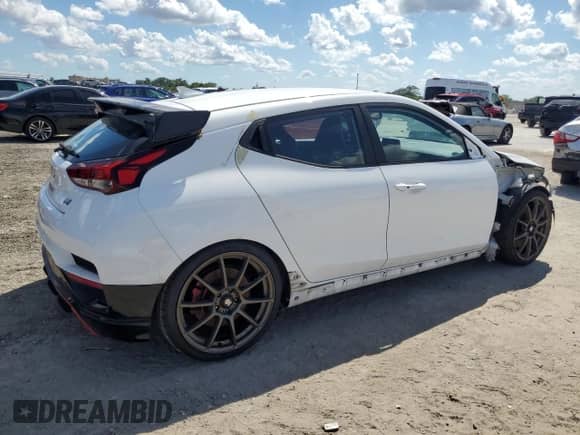 2021 Hyundai Veloster z VIN KMHT36AH6MU010330, wystawiony jako Copart lot #51061145 z przebiegiem Nie podano mil oraz Nie do naprawy • Non repairable. Historia ofert i sprzedaży dostępna na DreamBid. Obrazek 3.