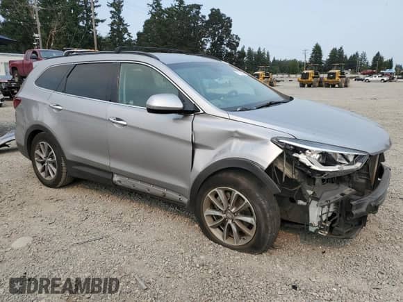 2017 Hyundai Santa Fe SE z VIN KM8SMDHFXHU167043, wystawiony jako Copart lot #71733645 z przebiegiem 120 667 mil mil oraz Szkoda całkowita • Salvage title. Historia ofert i sprzedaży dostępna na DreamBid. Obrazek 4.