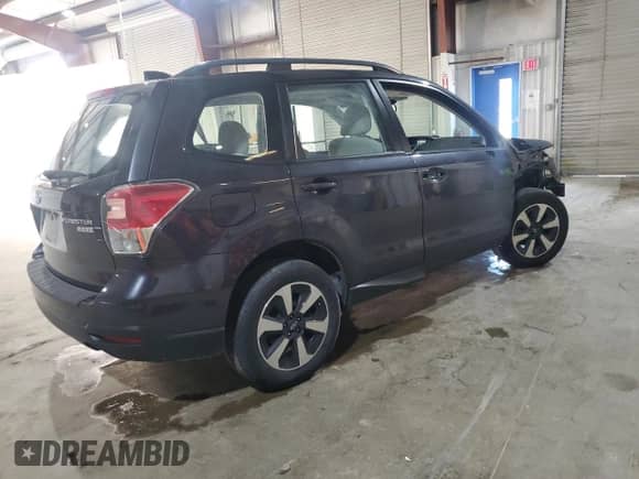 2017 Subaru Forester with VIN JF2SJABCXHH515332, listed as a Copart auction lot 85301185 with 112,823 mi miles and Salvage title. Bid and sale history available at DreamBid. Image 3.