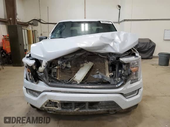 2022 Ford F-150 XLT с VIN 1FTFW1E89NKD15145, выставлен на аукционе Copart как лот 89542505 с пробегом 148 440 миль миль и Списание • Salvage title. История ставок и продаж доступна на DreamBid. Изображение 5.