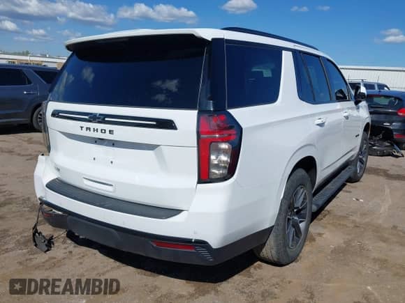 2023 Chevrolet Tahoe Z71 with VIN 1GNSKPKD0PR411701, listed as a IAAI auction lot 42065739 with 21,659 mi miles and . Bid and sale history available at DreamBid. Image 4.