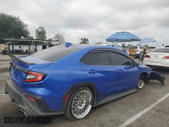 2023 Subaru WRX with VIN JF1VBAA66P9813007, listed as a Copart auction lot 55859385 with 24,270 mi miles and Salvage title. Bid and sale history available at DreamBid. Image 3.