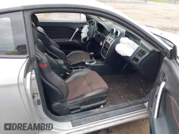 2006 Hyundai Tiburon GT с VIN KMHHN65F56U190508, выставлен на аукционе IAAI как лот 42107641 с пробегом 175 496 миль миль и . История ставок и продаж доступна на DreamBid. Изображение 5.