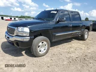 2004 GMC Sierra 1500 SLT with VIN 2GTEK13T941332525, listed as a Copart auction lot 64721925 with 242,636 mi miles and Salvage title. Bid and sale history available at DreamBid. Image 1.