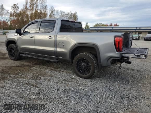 2020 GMC Sierra 1500 AT4 with VIN 3GTU9EET7LG382583, listed as a Copart auction lot 72927384 with 58,587 mi miles and Salvage title. Bid and sale history available at DreamBid. Image 2.