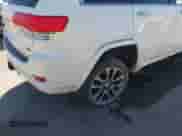 2018 Jeep Grand Cherokee Overland with VIN 1C4RJFCG7JC324708, listed as a IAAI auction lot 43294688 with 131,457 mi miles and . Bid and sale history available at DreamBid. Image 6.