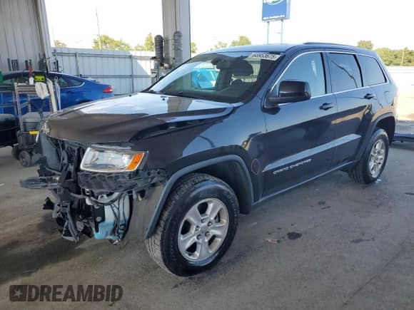 2014 Jeep Grand Cherokee Laredo z VIN 1C4RJFAG8EC280243, wystawiony jako Copart lot #68953675 z przebiegiem 121 886 mil mil oraz Szkoda całkowita • Salvage title. Historia ofert i sprzedaży dostępna na DreamBid. Obrazek 1.