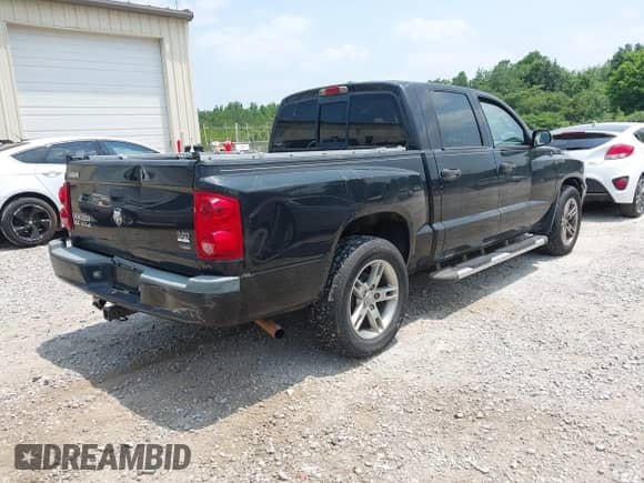 2007 Dodge Dakota SLT с VIN 1D7HW48P27S198997, выставлен на аукционе IAAI как лот 42411491 с пробегом 183 825 миль миль и . История ставок и продаж доступна на DreamBid. Изображение 4.