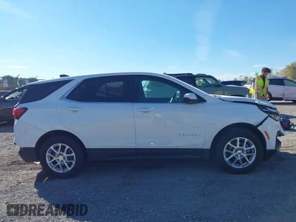2024 Chevrolet Equinox LT with VIN 3GNAXUEG2RS236482, listed as a IAAI auction lot 43376267 with 19,685 mi miles and . Bid and sale history available at DreamBid. Image 14.