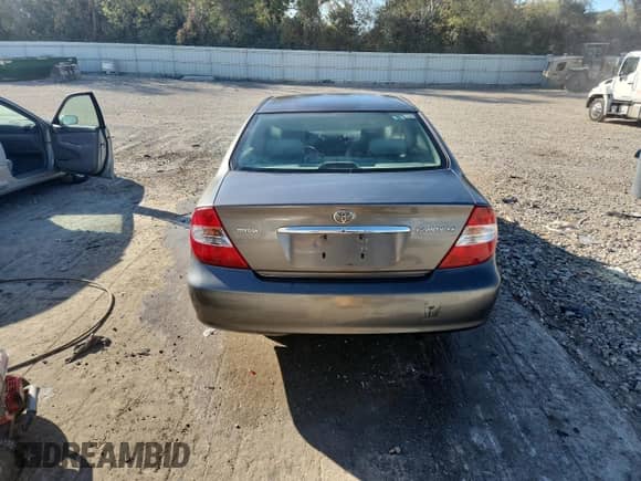 2002 Toyota Camry LE with VIN JTDBE32K220023762, listed as a Copart auction lot 85343375 with 242,626 mi miles and Non repairable. Bid and sale history available at DreamBid. Image 6.