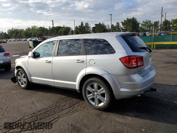 2009 Dodge Journey SXT with VIN 3D4GH57V09T508350, listed as a Copart auction lot 66213735 with 149,765 mi miles and Salvage title. Bid and sale history available at DreamBid. Image 2.