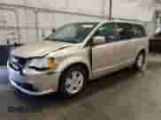 2013 Dodge Grand Caravan Crew with VIN 2C4RDGDG6DR700029, listed as a Copart auction lot 69057705 with 64,797 mi miles and Salvage title. Bid and sale history available at DreamBid. Image 1.