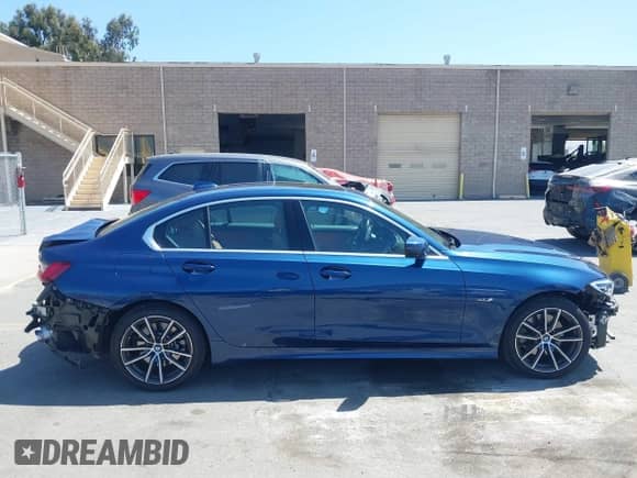 2022 BMW 3 Series 330e with VIN 3MW5P7J07N8C39029, listed as a IAAI auction lot 42604371 with 46,091 mi miles and . Bid and sale history available at DreamBid. Image 14.