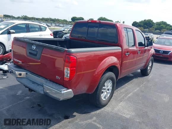 2019 Nissan Frontier SV with VIN 1N6AD0ERXKN775263, listed as a IAAI auction lot 43166750 with 154,012 mi miles and . Bid and sale history available at DreamBid. Image 4.