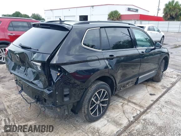 2021 Volkswagen Tiguan SE с VIN 3VV2B7AXXMM058256, выставлен на аукционе IAAI как лот 43250700 с пробегом 33 409 миль миль и . История ставок и продаж доступна на DreamBid. Изображение 4.