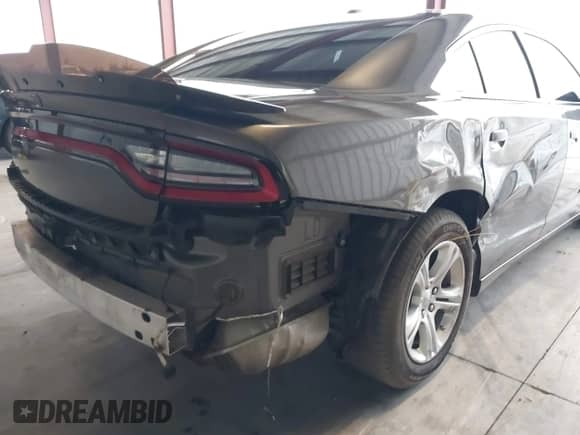 2022 Dodge Charger SXT with VIN 2C3CDXBG6NH161383, listed as a IAAI auction lot 43355583 with 57,196 mi miles and . Bid and sale history available at DreamBid. Image 6.