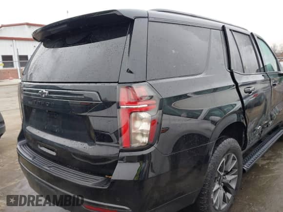 2023 Chevrolet Tahoe Z71 with VIN 1GNSKPKD8PR212704, listed as a IAAI auction lot 41294229 with 31,768 mi miles and . Bid and sale history available at DreamBid. Image 18.