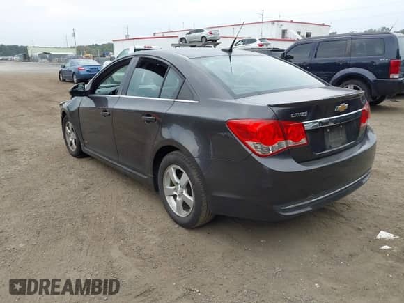 2014 Chevrolet Cruze 1LT with VIN 1G1PC5SB1E7306214, listed as a IAAI auction lot 43287022 with 140,046 mi miles and . Bid and sale history available at DreamBid. Image 3.