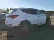 2017 Hyundai Santa Fe 2.4L z VIN 5NMZUDLB9HH010036, wystawiony jako Copart lot #87078565 z przebiegiem 81 235 mil mil oraz Szkoda całkowita • Salvage title. Historia ofert i sprzedaży dostępna na DreamBid. Obrazek 3.