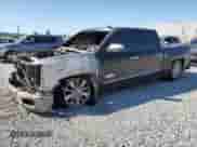 2014 Chevrolet Silverado 1500 High Country z VIN 3GCPCTEC5EG391434, wystawiony jako Copart lot #49719065 z przebiegiem Nie podano mil oraz Szkoda całkowita • Salvage title. Historia ofert i sprzedaży dostępna na DreamBid. Obrazek 1.