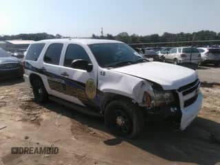 2013 Chevrolet Tahoe Commercial with VIN 1GNLC2E01DR281128, listed as a IAAI auction lot 43026550 with 156,342 mi miles and . Bid and sale history available at DreamBid. Image 1.