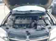 2009 Dodge Avenger SE z VIN 1B3LC46B99N520235, wystawiony jako IAAI lot #42719558 z przebiegiem 116 877 mil mil oraz . Historia ofert i sprzedaży dostępna na DreamBid. Obrazek 10.