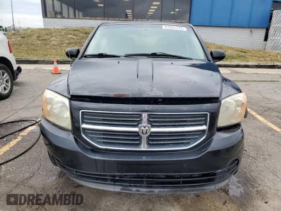 2009 Dodge Caliber SXT z VIN 1B3HB48A59D104346, wystawiony jako Copart lot #81551775 z przebiegiem 211 208 mil mil oraz Szkoda całkowita • Salvage title. Historia ofert i sprzedaży dostępna na DreamBid. Obrazek 5.
