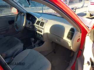 2005 Hyundai Accent GLS with VIN KMHCG45CX5U608980, listed as a IAAI auction lot 43440401 with 137,550 mi miles and . Bid and sale history available at DreamBid. Image 5.