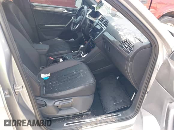 2023 Volkswagen Tiguan SE R-Line Black с VIN 3VVCB7AX4PM010437, выставлен на аукционе IAAI как лот 42584010 с пробегом 49 762 миль миль и . История ставок и продаж доступна на DreamBid. Изображение 5.