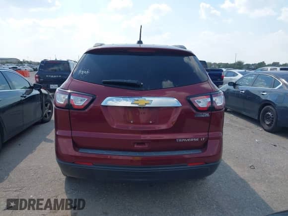 2016 Chevrolet Traverse LT z VIN 1GNKRGKD8GJ296758, wystawiony jako IAAI lot #43209345 z przebiegiem 97 883 mil mil oraz . Historia ofert i sprzedaży dostępna na DreamBid. Obrazek 16.